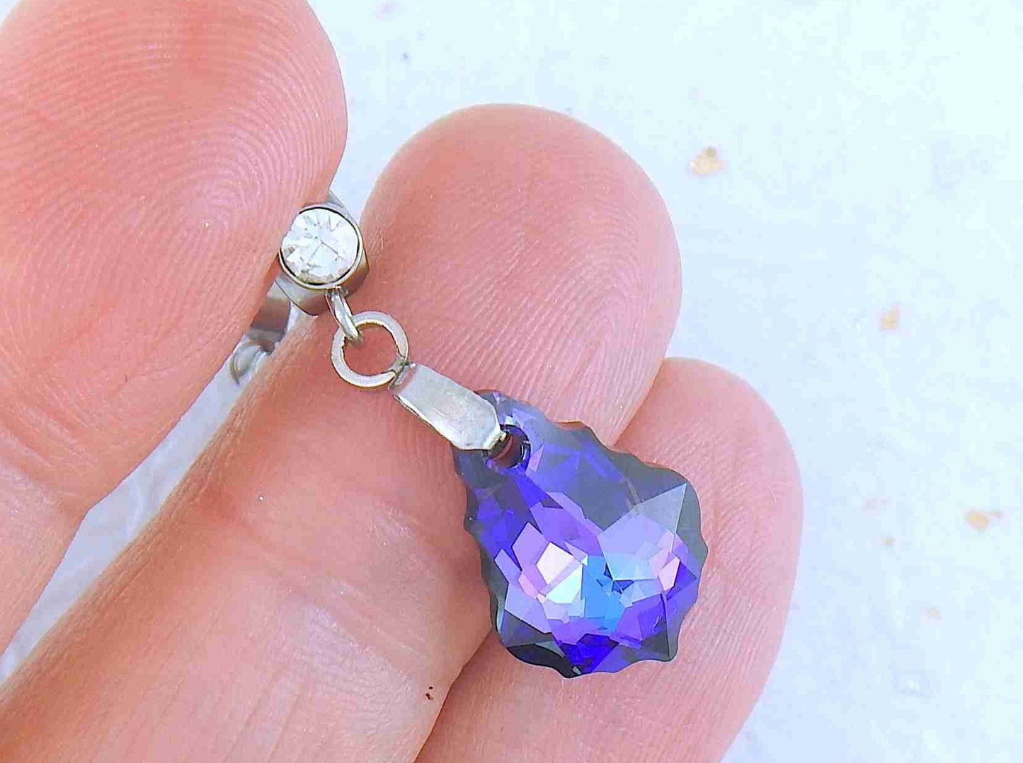 Short earrings with 16mm Heliotrope (blue/violet) baroque Swarovski crystals, stainless steel studs with tiny clear crystals