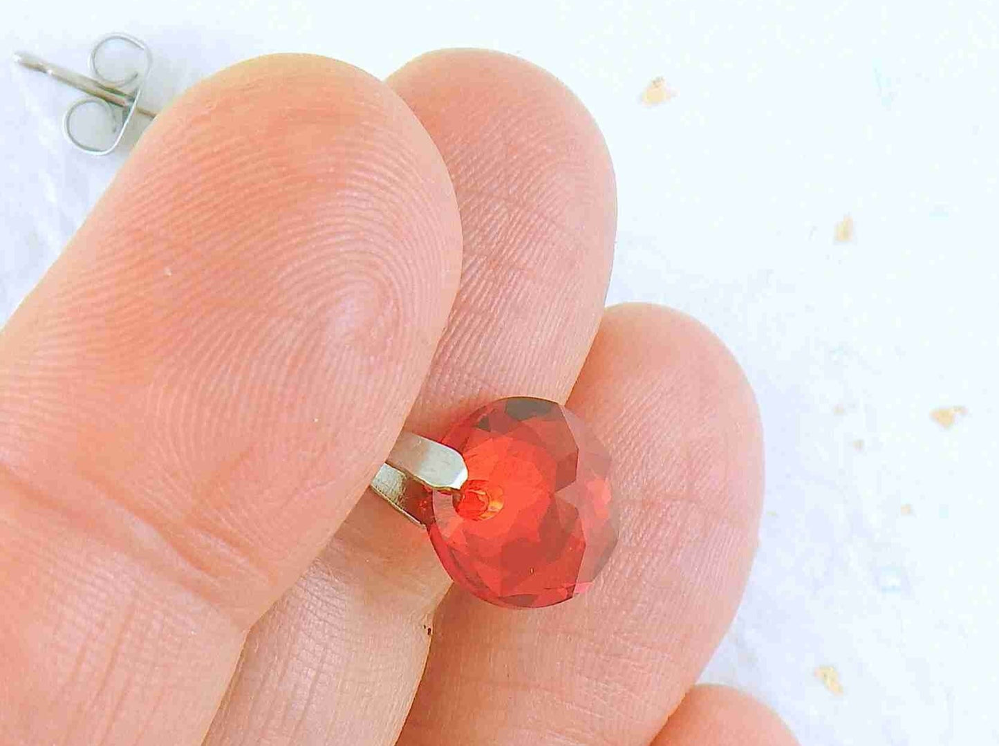 Short earrings with 10mm Astral Pink/Light Siam (red/pink) Classic Cut Swarovski crystals, stainless steel studs with tiny crystals