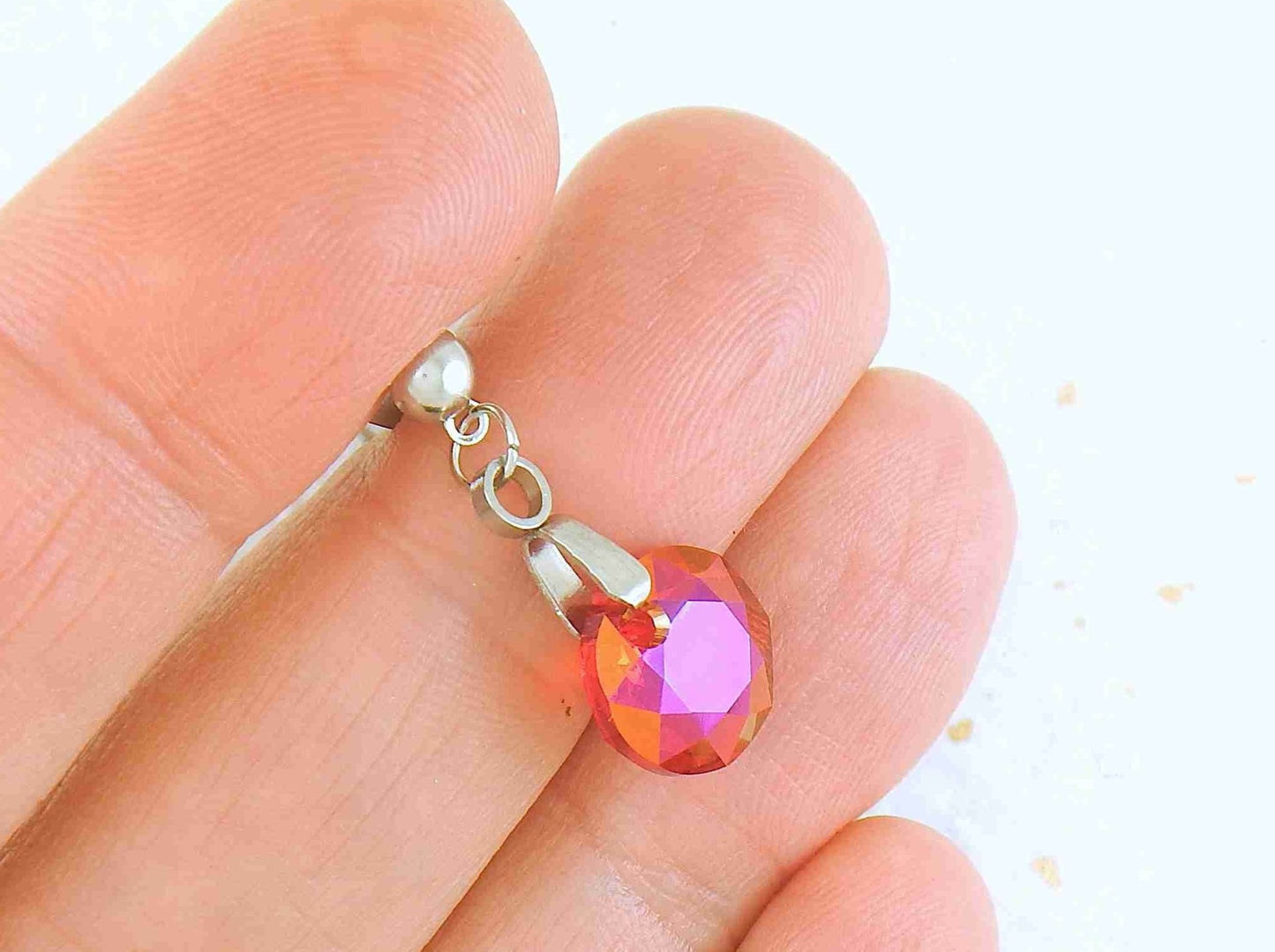 Short earrings with 10mm Astral Pink/Light Siam (red/pink) Classic Cut Swarovski crystals, stainless steel studs with tiny crystals