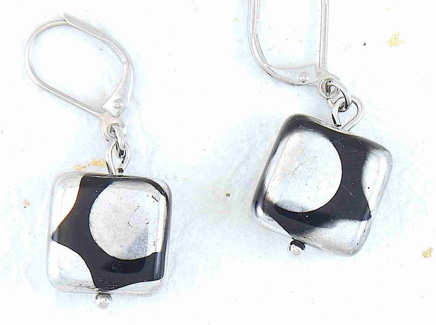 Short earrings with small shiny black Czech glass squares, large silver/copper/multicoloured dots, stainless steel lever back hooks