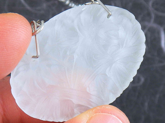 18-inch necklace with large oval matte vintage crystal pendant, sculpted on both sides (Lalique-style flower and leaf pattern), stainless steel chain