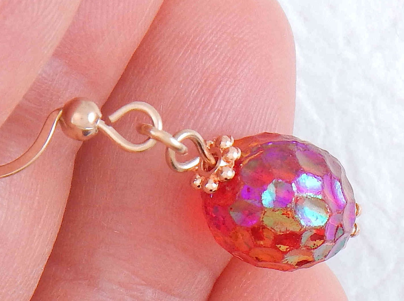 Short earrings with iridescent deep burgundy red vintage glass raspberry beads, rose gold-toned stainless steel hooks