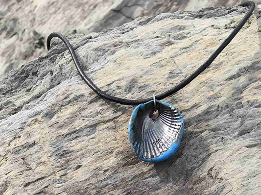 20-inch necklace with black nickel and turquoise shell pendant handmade in Montreal, black leather cord, stainless steel clasp