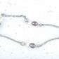 Anklet with iridescent violet and white natural freshwater pearls on stainless steel chain