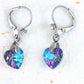 Short earrings with 10mm faceted Vitrail Light (sky blue and lilac) Swarovski crystal hearts, stainless steel lever back hooks with tiny clear crystals