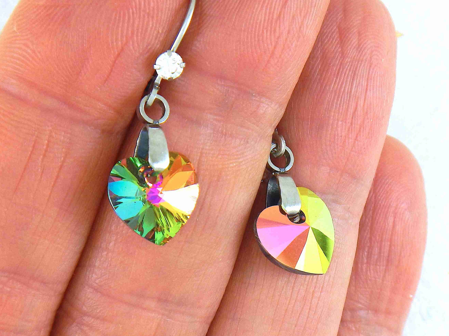 Short earrings with 10mm faceted Vitrail Medium (fuchsia, orange, green) Swarovski crystal hearts, stainless steel lever back hooks with tiny clear crystals