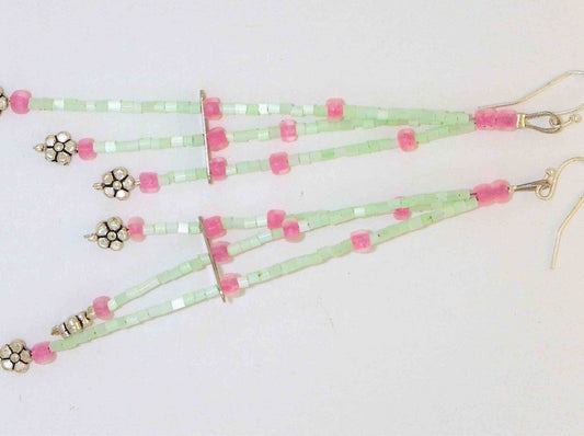 Very long earrings with 3 delicate strands in mint green and candy pink, silver coloured flowers, metal hooks