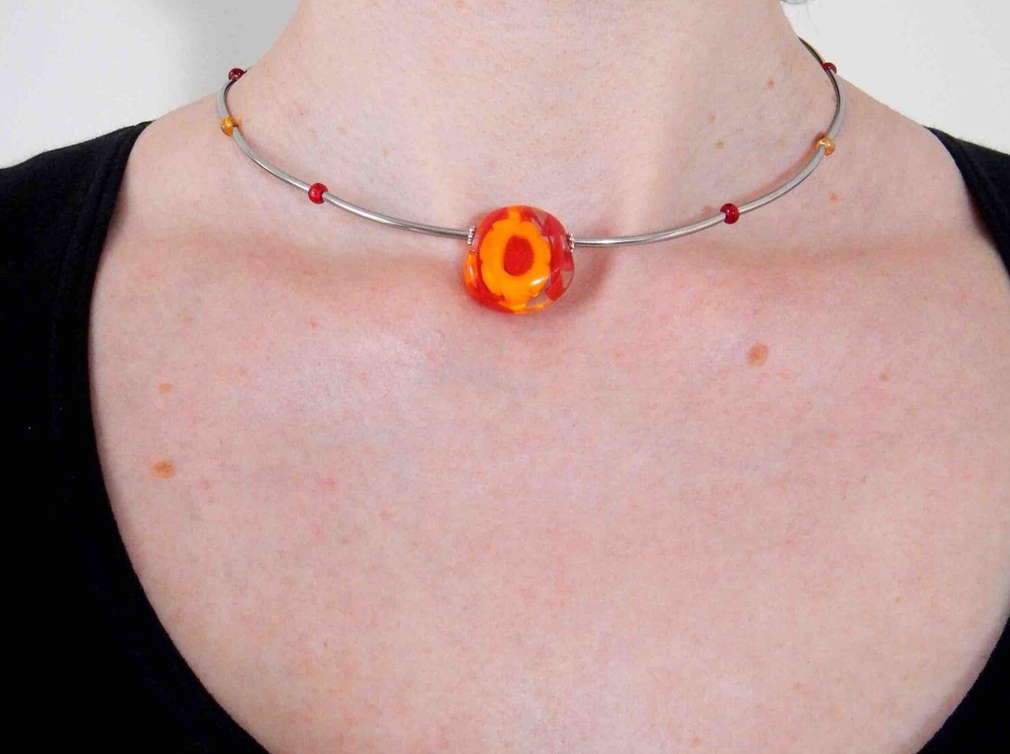 Choker necklace with bright red and yellow flower murine glass bead (Murano-style glass handmade in Montreal), stainless steel tube beads and clasp