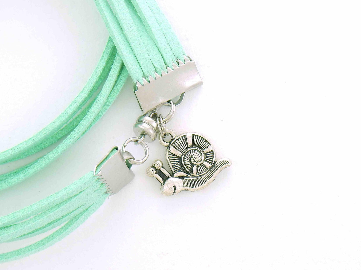 Wrap bracelet in mint green faux suede, happy snail pewter charm, magnetic stainless steel clasp