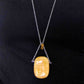 30-inch necklace with large rectangular honey yellow calcite stone pendant, triangular layout, matching glass beads, stainless steel chain