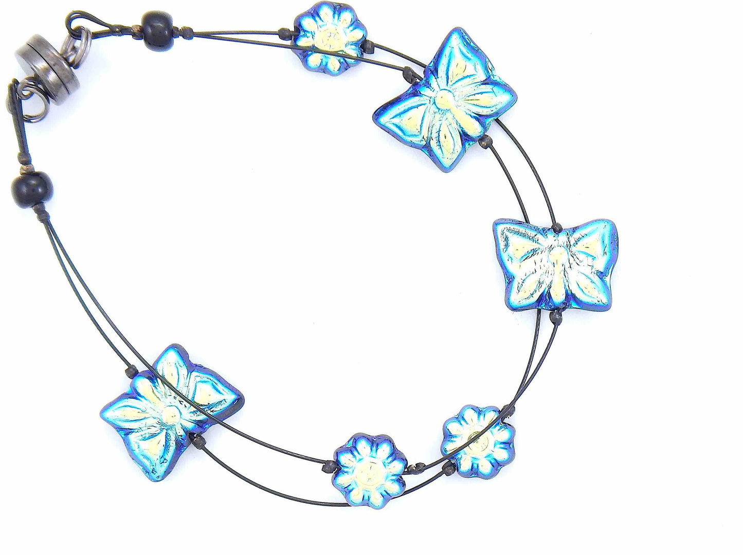 Double-row bracelet with black and iridescent blue Czech glass butterflies and flowers, magnetic black nickel clasp
