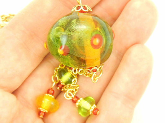 27-inch necklace with large funky glass ball and matching pendants in lime green-red-yellow (Murano-style glass handmade in Montreal), dots and bubbles, gold-toned stainless steel chain