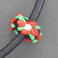 Collier tour de cou avec bille de verre noir (verre style Murano fait main à Montréal), fleurs tridimensionnelles rouge-vert-blanc, cordon de cuir noir, fermoir acier inoxydable