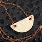 20-inch necklace with off-white half-circle ceramics pendant handmade in Montreal, rose gold-toned stainless steel chain