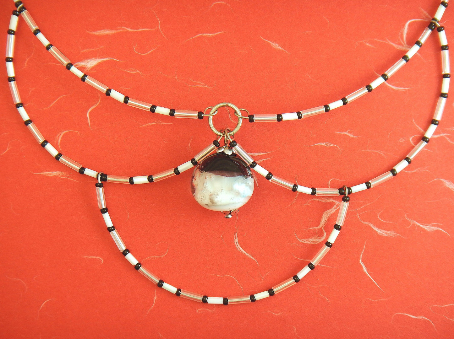 15-inch signature necklace with articulated black and white hoops and lampworked glass bead (Murano-style glass handmade in Montreal)