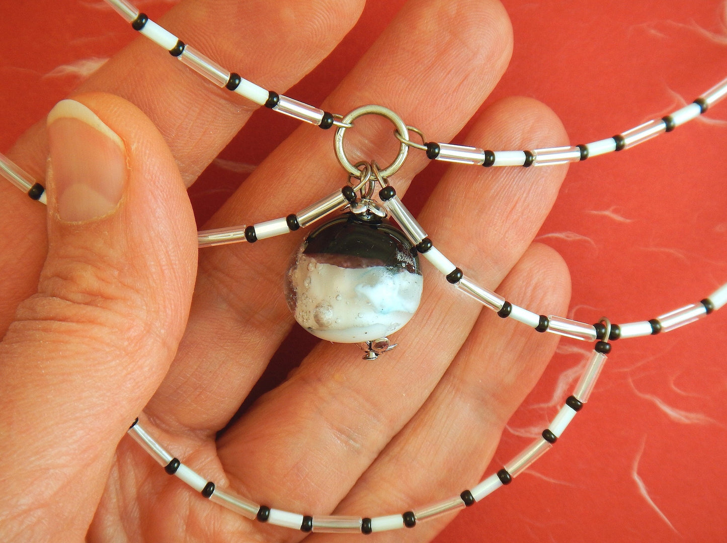 15-inch signature necklace with articulated black and white hoops and lampworked glass bead (Murano-style glass handmade in Montreal)