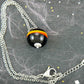 14-inch necklace with funky black ball marbled in red and yellow (Murano-style glass handmade in Montreal), stainless steel chain