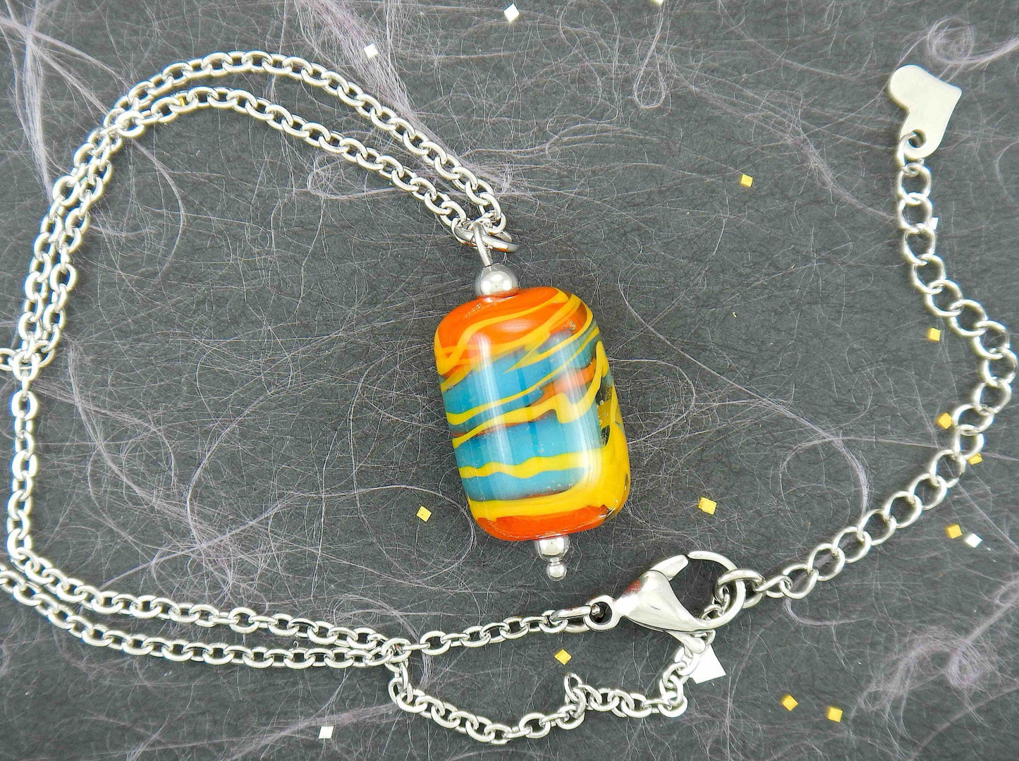 14-inch necklace with burnt orange glass cylinder marbled in turquoise & yellow (Murano-style glass handmade in Montreal), stainless steel chain