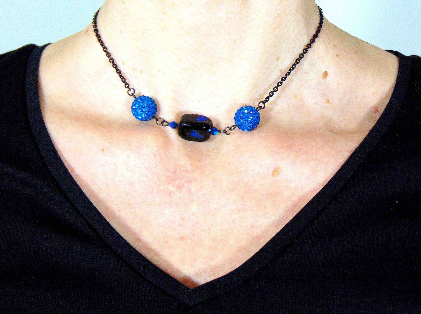 15-inch necklace with black and blue glass cube (Murano-style glass handmade in Montreal), bright blue Shambala beads, black stainless steel chain