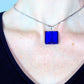 16-inch necklace with deep blue Murano glass on silver foil square, rectangle-link stainless steel chain
