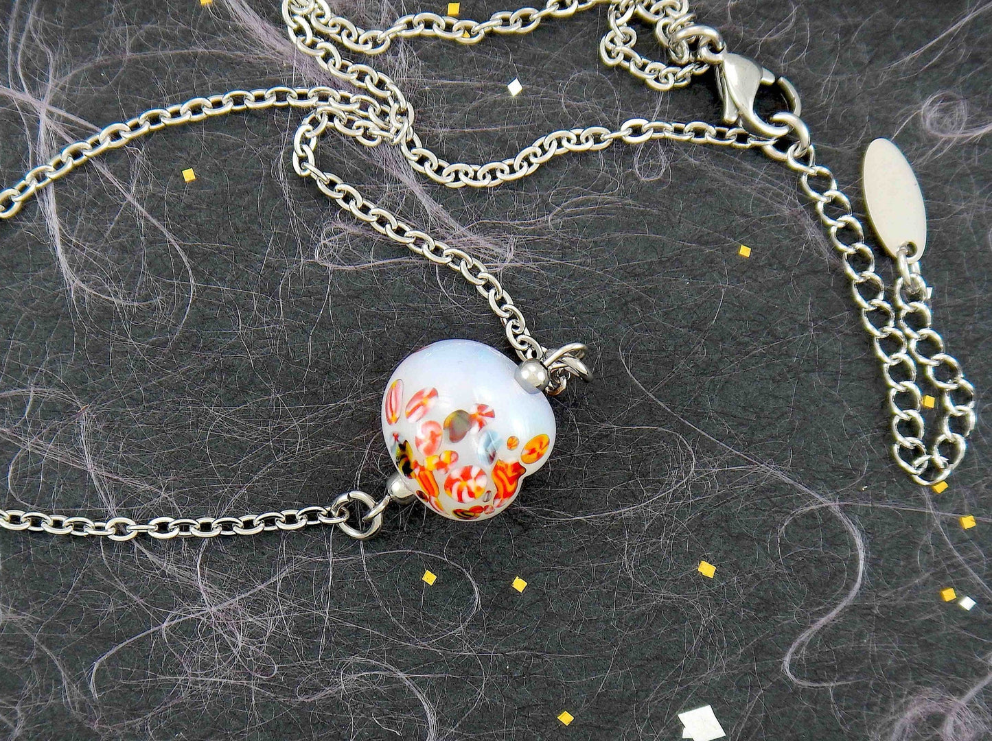 14-inch necklace with opalescent white vintage glass nugget, speckled with tiny multicoloured patterns, stainless steel chain