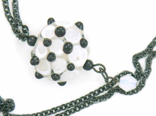 29-inch necklace with clear Murano glass pendant, flat white dots and 3D black dots, Opaline Swarovski crystal, black stainless steel chain