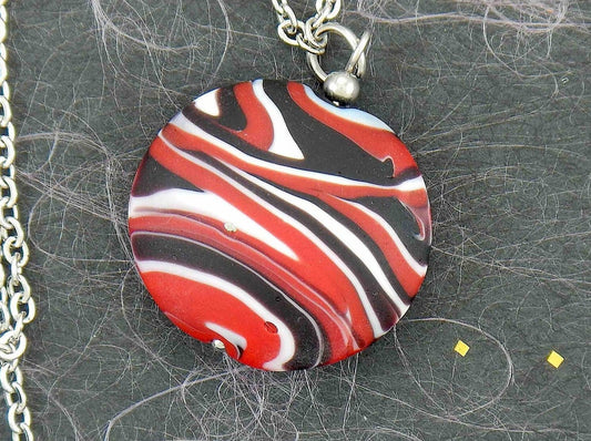 29-inch necklace with matte plump Murano glass disc, marbled in red-black-white, stainless steel chain