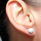 Ear studs with 8mm round white howlite stone cabochons, stainless steel posts