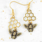 Long earrings with brass bees and honeycombs, gold-toned stainless steel hooks