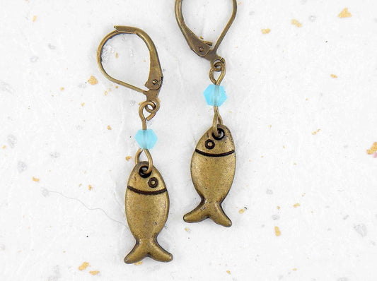 Short earrings with stylized brass fish and bright turquoise Swarovski crystals, brass lever back hooks