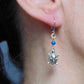Long earrings with small silver turtles and metallic blue Swarovski crystals, stainless steel lever back hooks