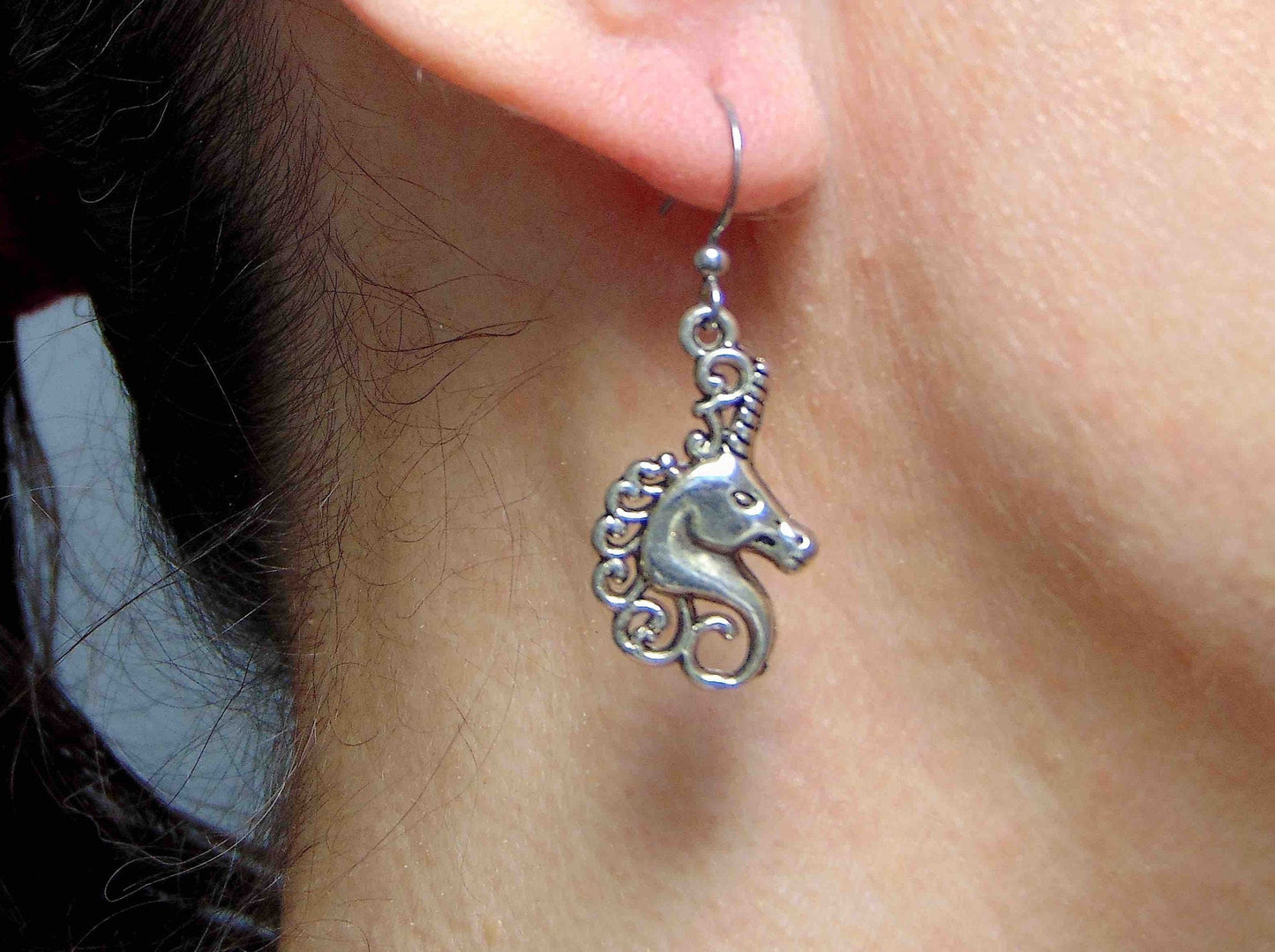 Short earrings with pewter unicorn heads, stainless steel hooks