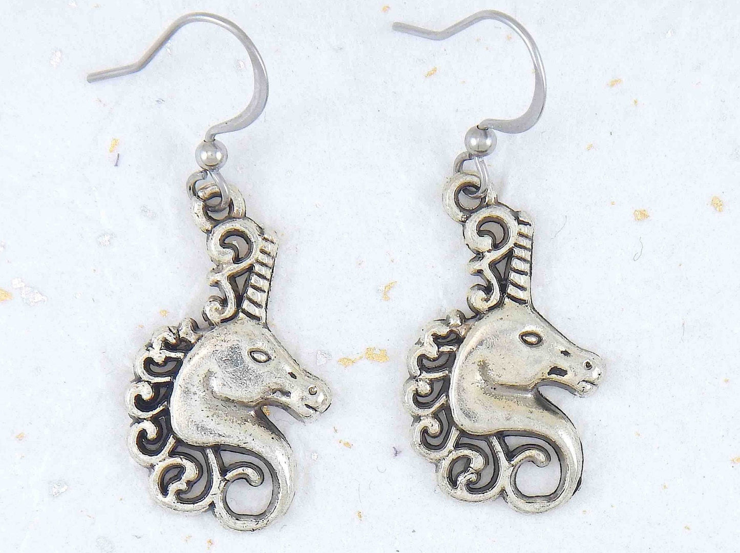 Short earrings with pewter unicorn heads, stainless steel hooks