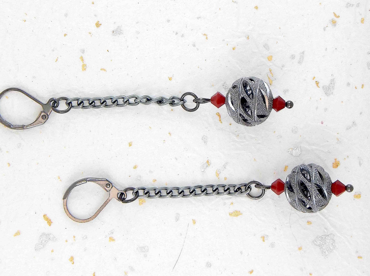 Long earrings with black nickel filigree balls and Swarovski crystals, black-nickel metal lever back hooks