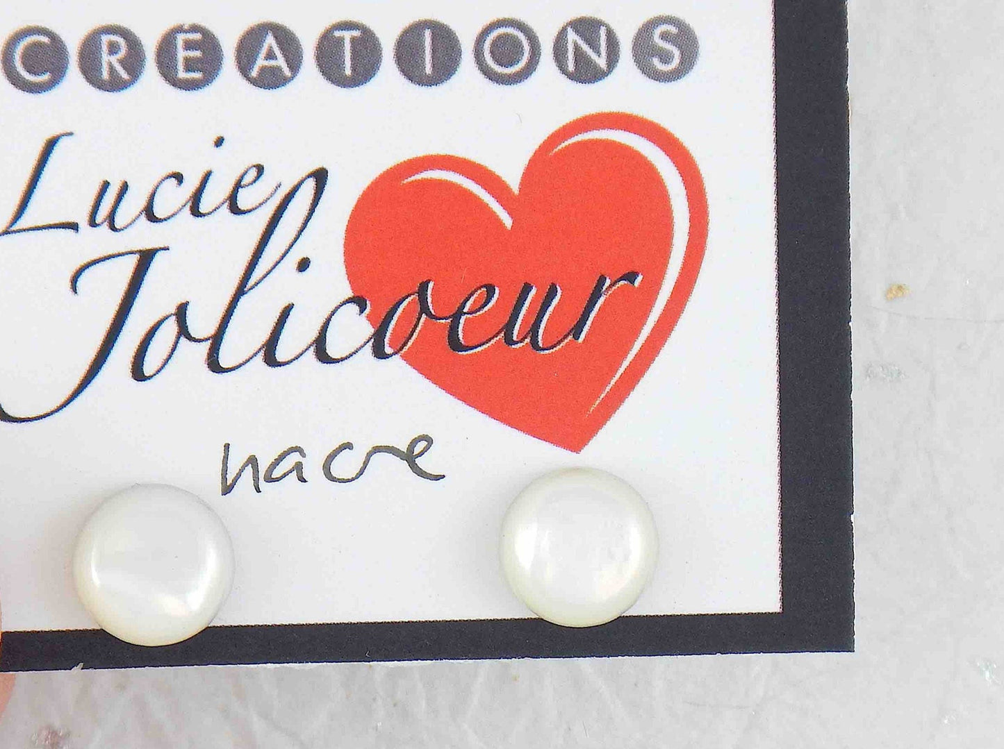 Ear studs with 8mm round iridescent white mother of pearl cabochons, stainless steel posts