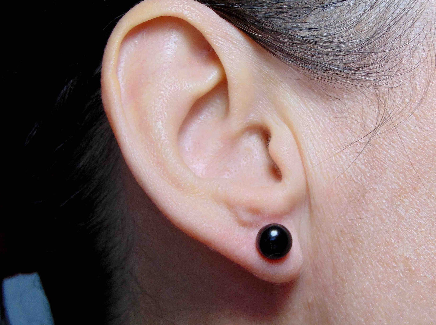 Ear studs with 9mm round dark blue goldstone cabochons, stainless steel posts