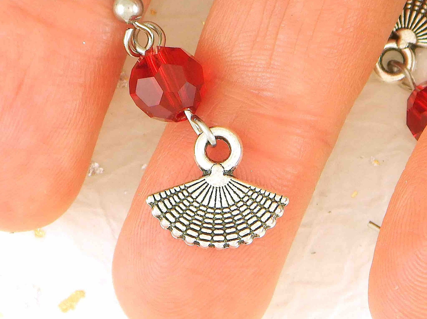 Long earrings with tiny pewter fans and red crystal balls, stainless steel hooks