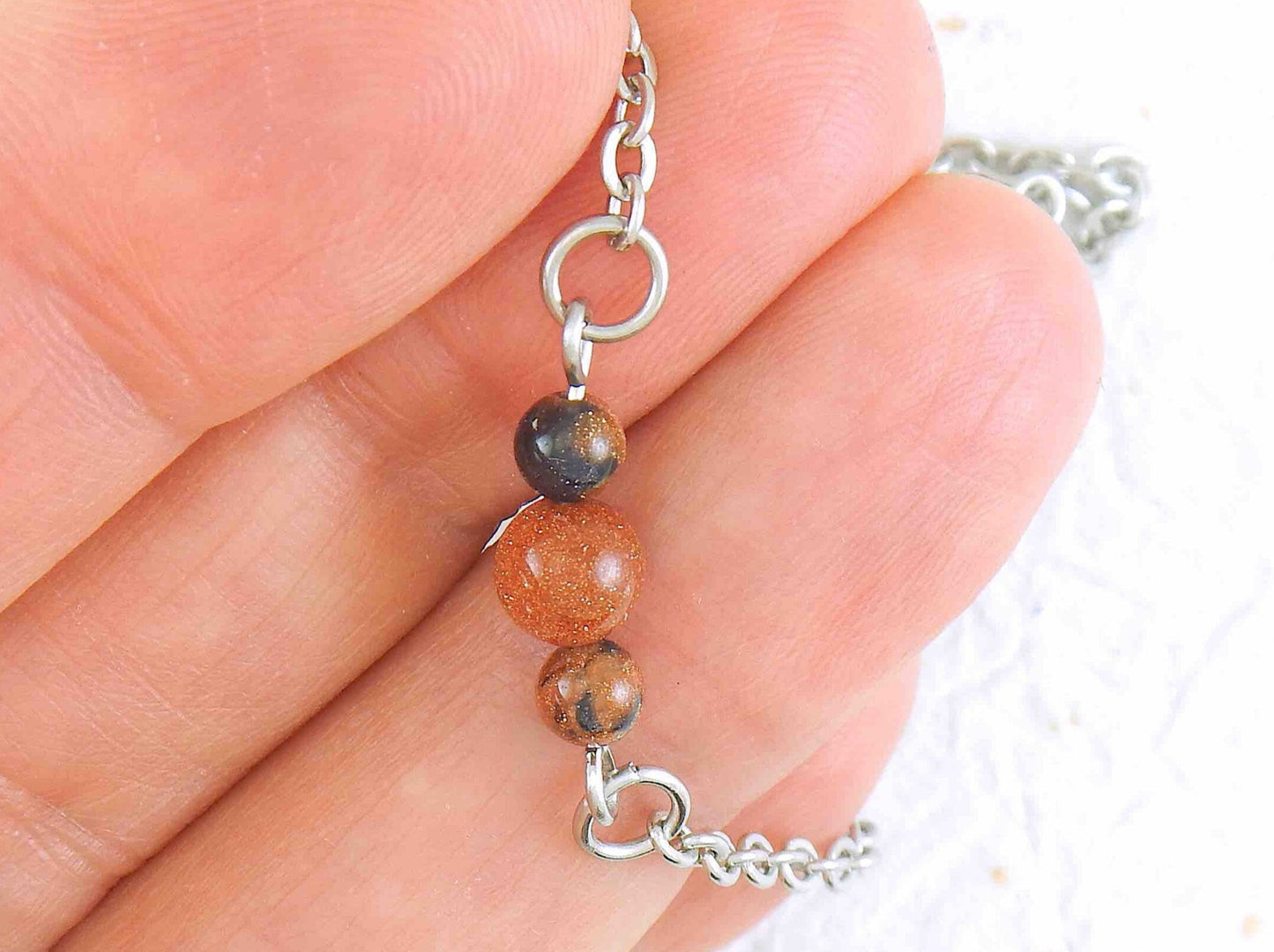 Anklet with mixed golden and blue goldstone on hypoallergenic stainless steel chain