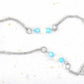 Chaîne de cheville avec perles d'eau douce blanches et cristaux Swarovski sur chaîne acier inoxydable hypo allergène