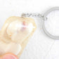 Keychain with handmade resin rectangle, white beach sand, white and pink shells, stainless steel chain