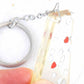 Keychain with handmade resin parallelepiped, tiny red and silver hearts, stainless steel chain
