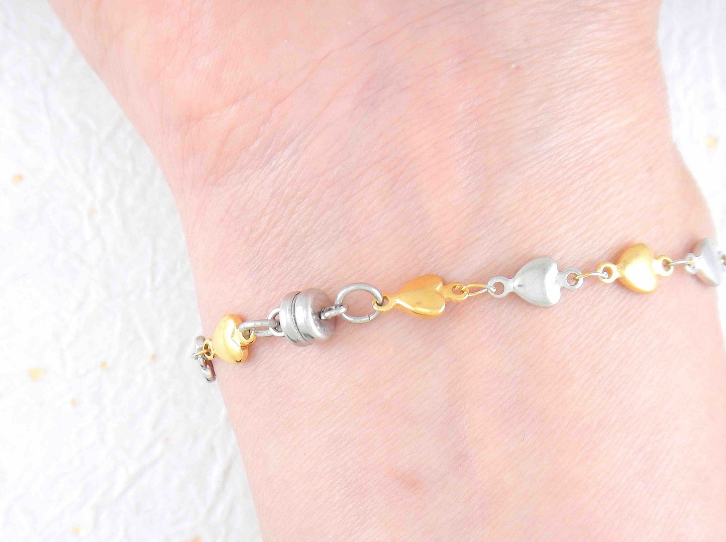 Bracelet with alternating tiny gold and silver hearts, magnetic clasp, all hypo allergenic stainless steel