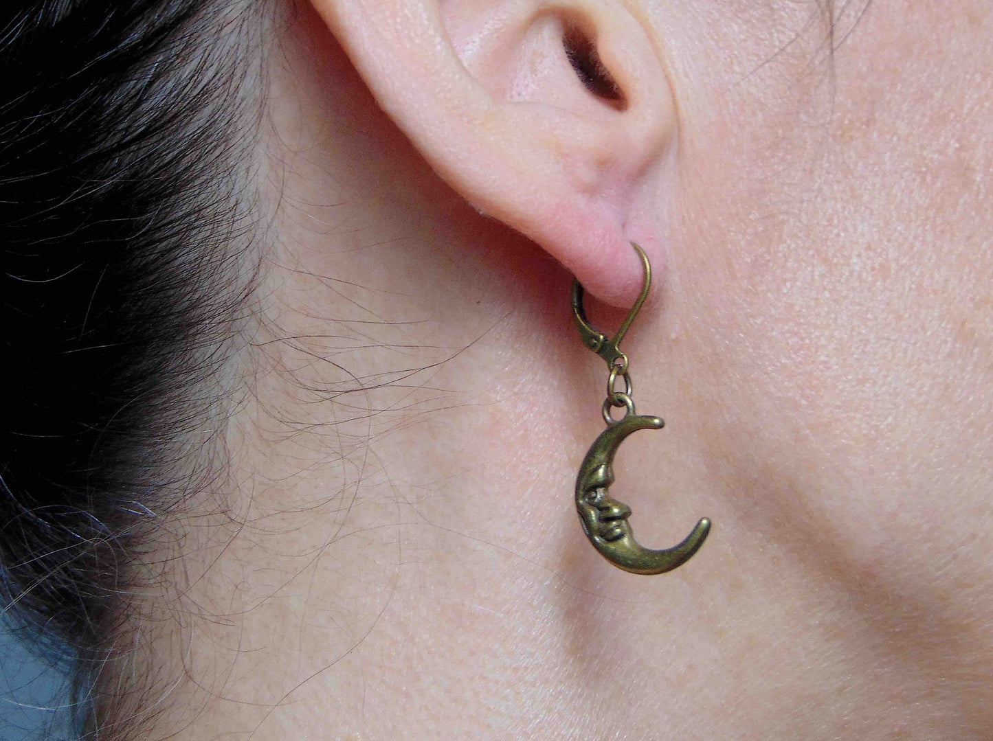 Short earrings, moon crescents with a face, brass lever back hooks