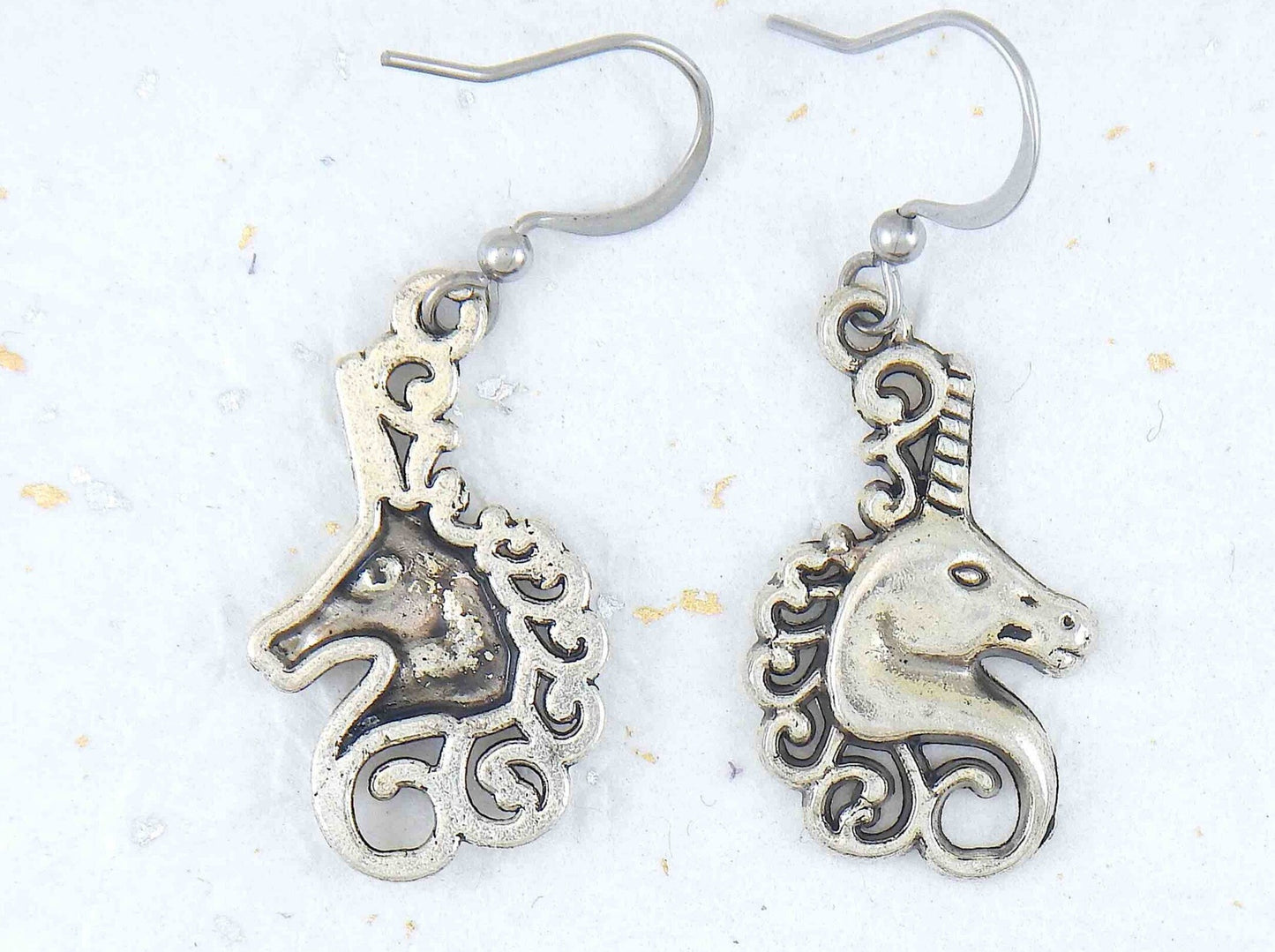 Short earrings with pewter unicorn heads, stainless steel hooks