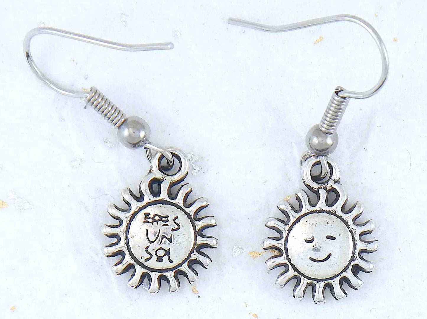 Short earrings with pewter smiling suns, stainless steel hooks
