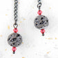 Long earrings with black nickel filigree balls and Swarovski crystals, black-nickel metal lever back hooks