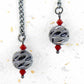 Long earrings with black nickel filigree balls and Swarovski crystals, black-nickel metal lever back hooks