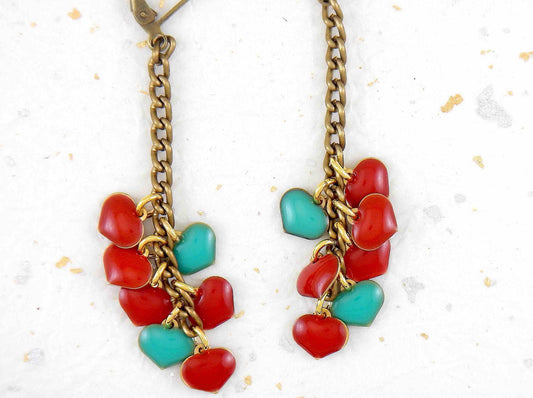 Long earrings with 7 small cascading red and turquoise enamelled brass hearts, aluminum chain, brass lever back hooks