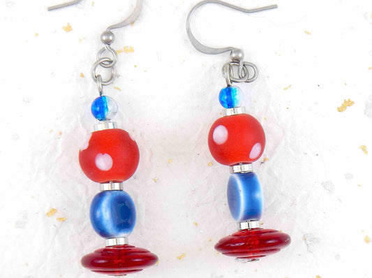 Long earrings with white dotted red balls, blue pellets and translucent red disks, stainless steel hooks