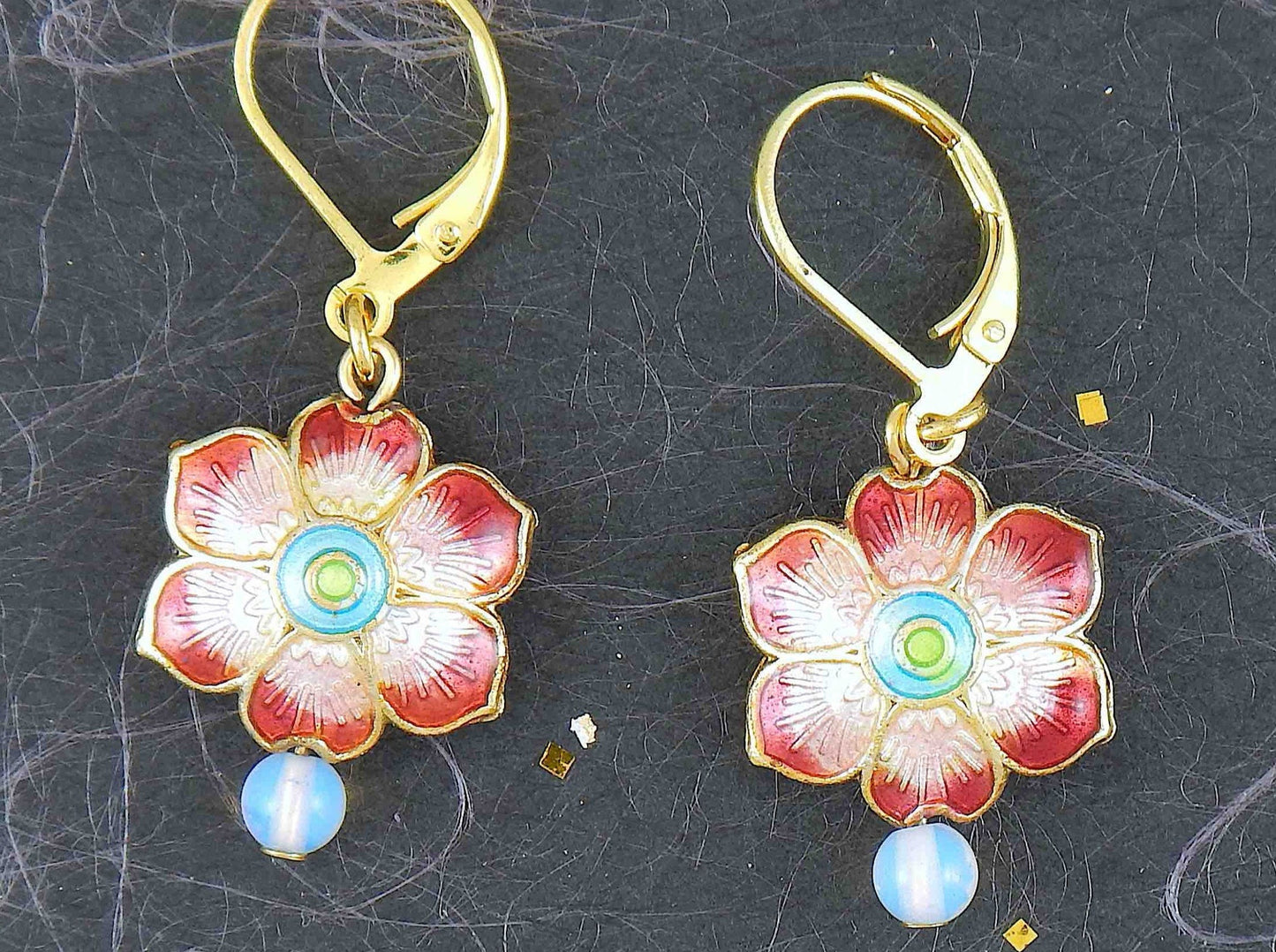 Short earrings with small enamelled flowers offered in 6 colours, synthetic moonstone (opalite), gold-toned stainless steel lever back hooks
